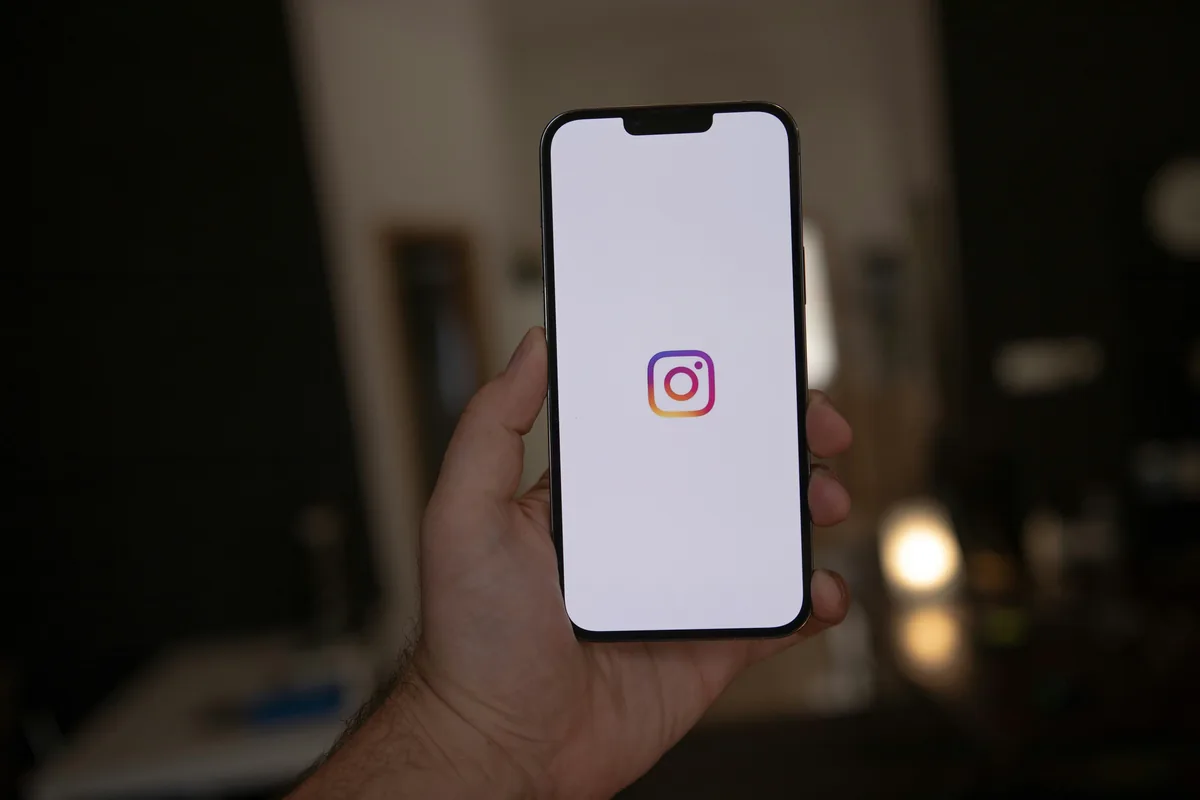 Instagram for business India — phone showing Instagram feed